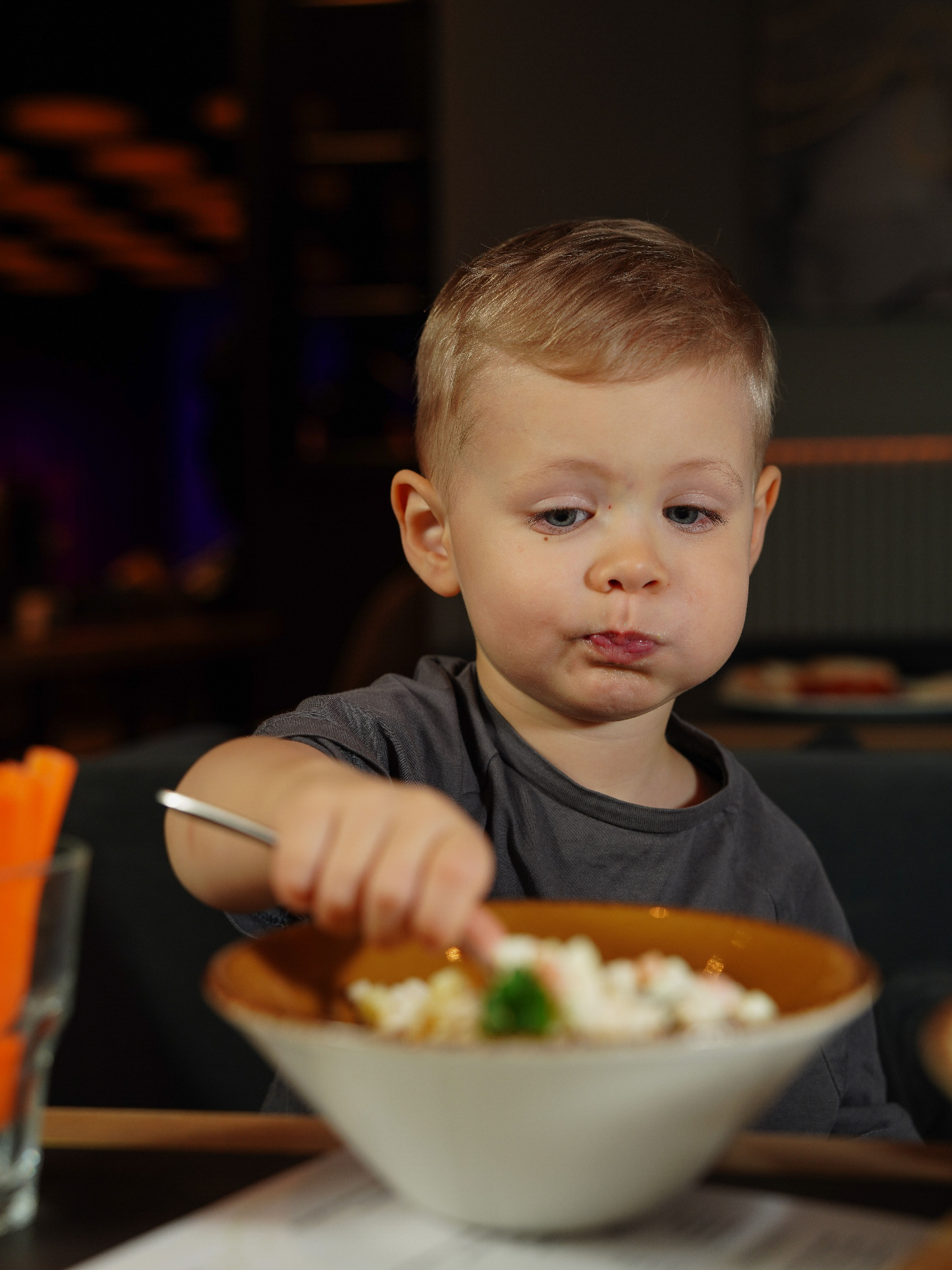 Young boy enjoying a children's meal at Hammerman's restaurant in Aberdeen